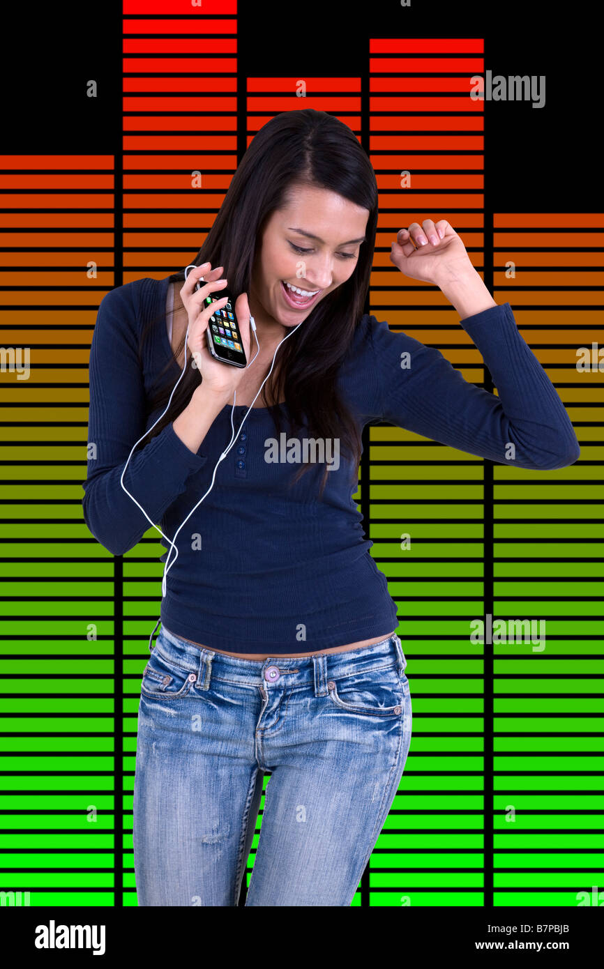 Girl dancing with headphones to mp3 music with iphone with graphic  equalizer background Stock Photo - Alamy