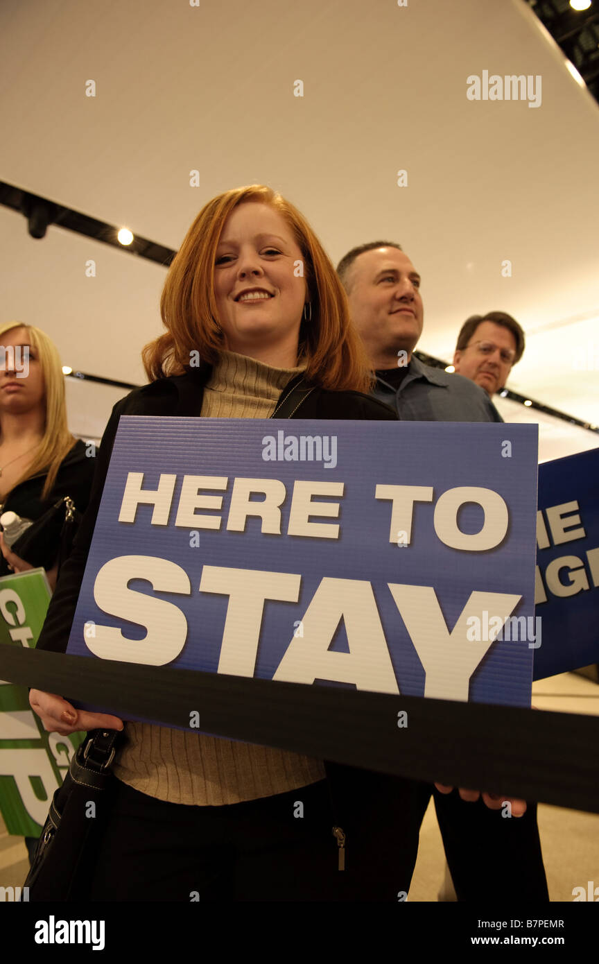 General Motors workers show support for their company before a press conference at the 2009 Detroit Auto Show Stock Photo