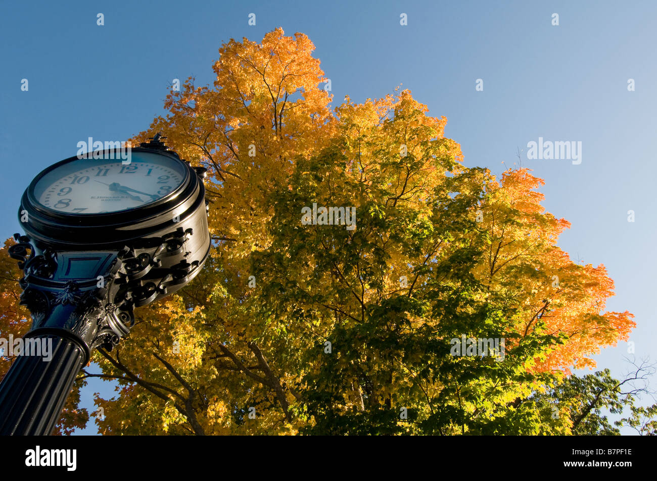 Clock and fall foliage, Bar Harbor Maine, New England USA Stock Photo