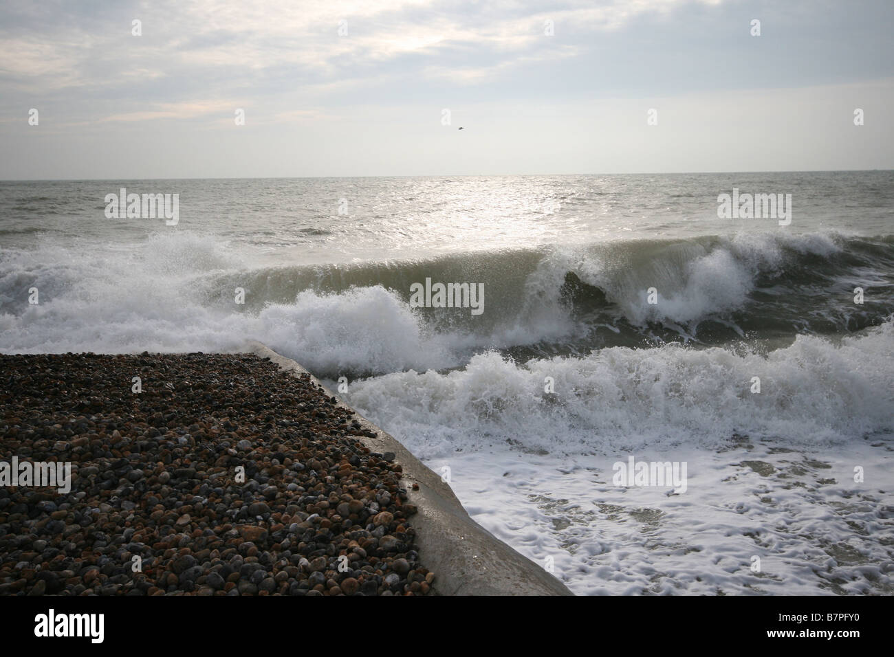 Waves on Brighton beach Stock Photo