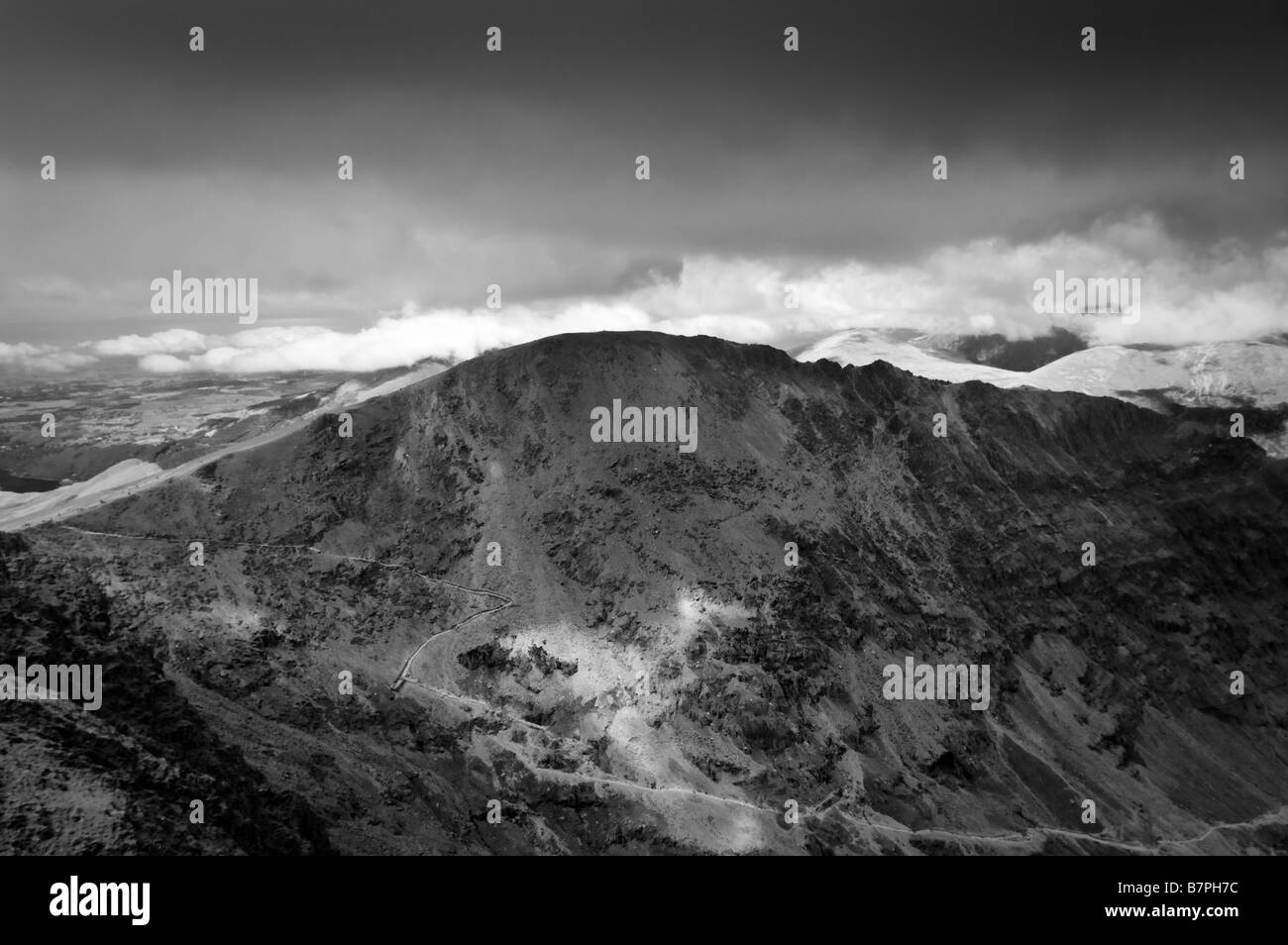 Crib Goch peak Snowdonia Wales From summit of Snowdon Stock Photo