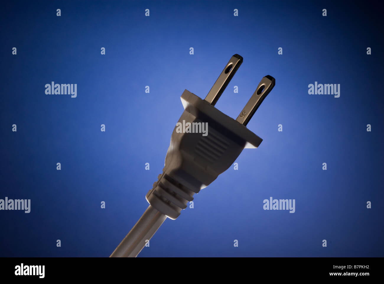a two pronged polarized power cord and plug Stock Photo