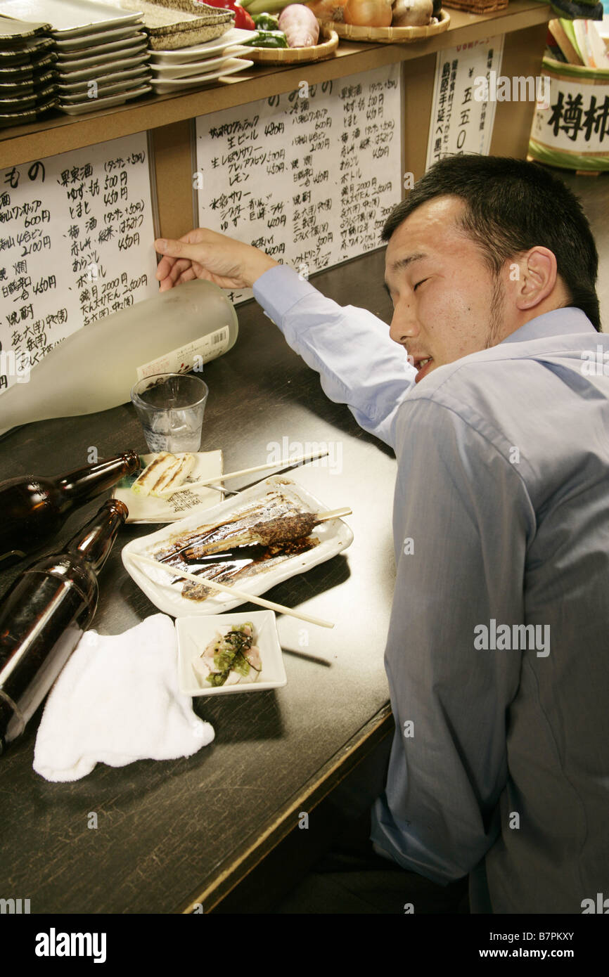 Drunk man lying face down hires stock photography and images Alamy