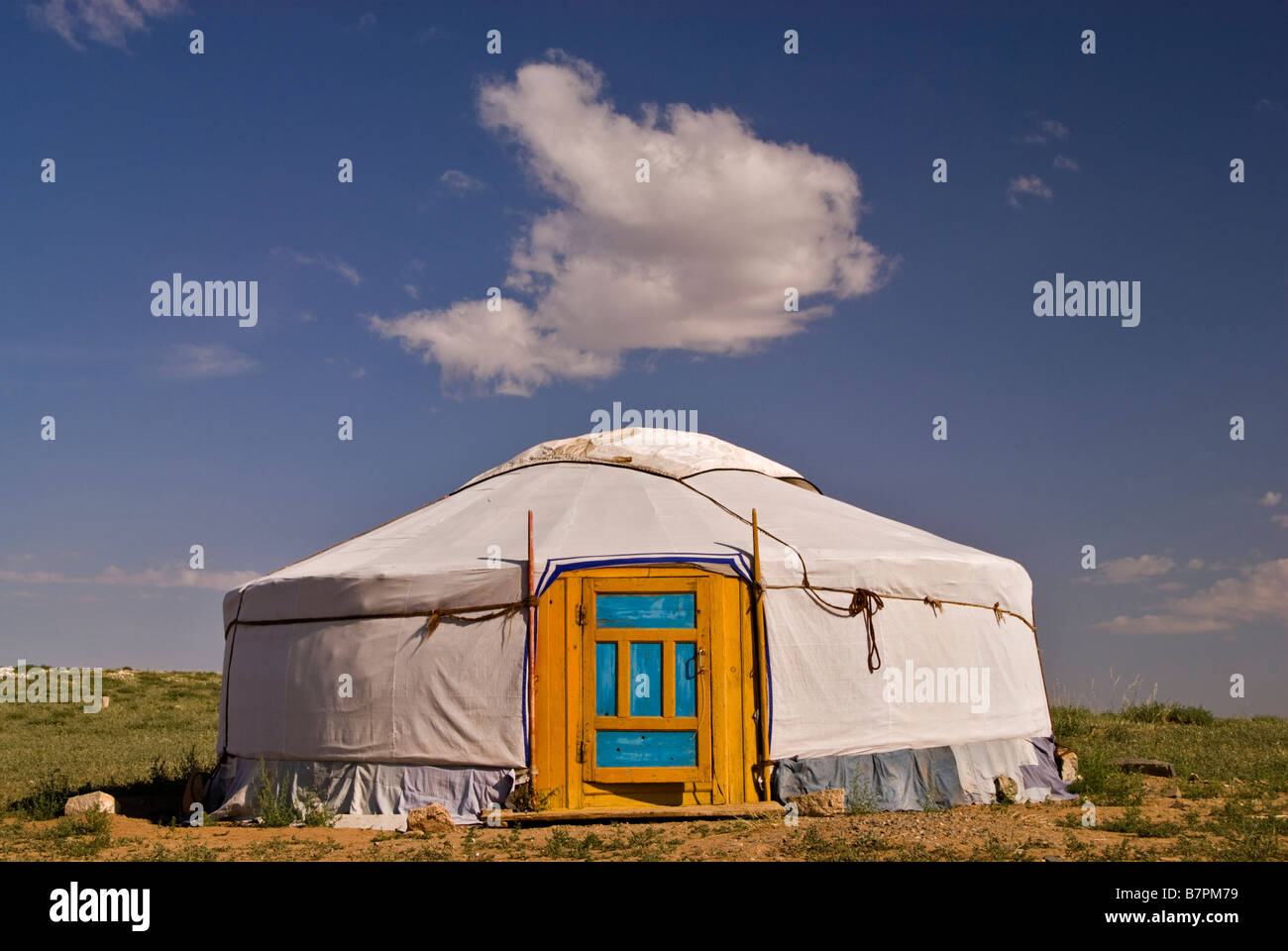 Yurt and blue sky with clouds in the Gobi desert, Mongolia Stock Photo