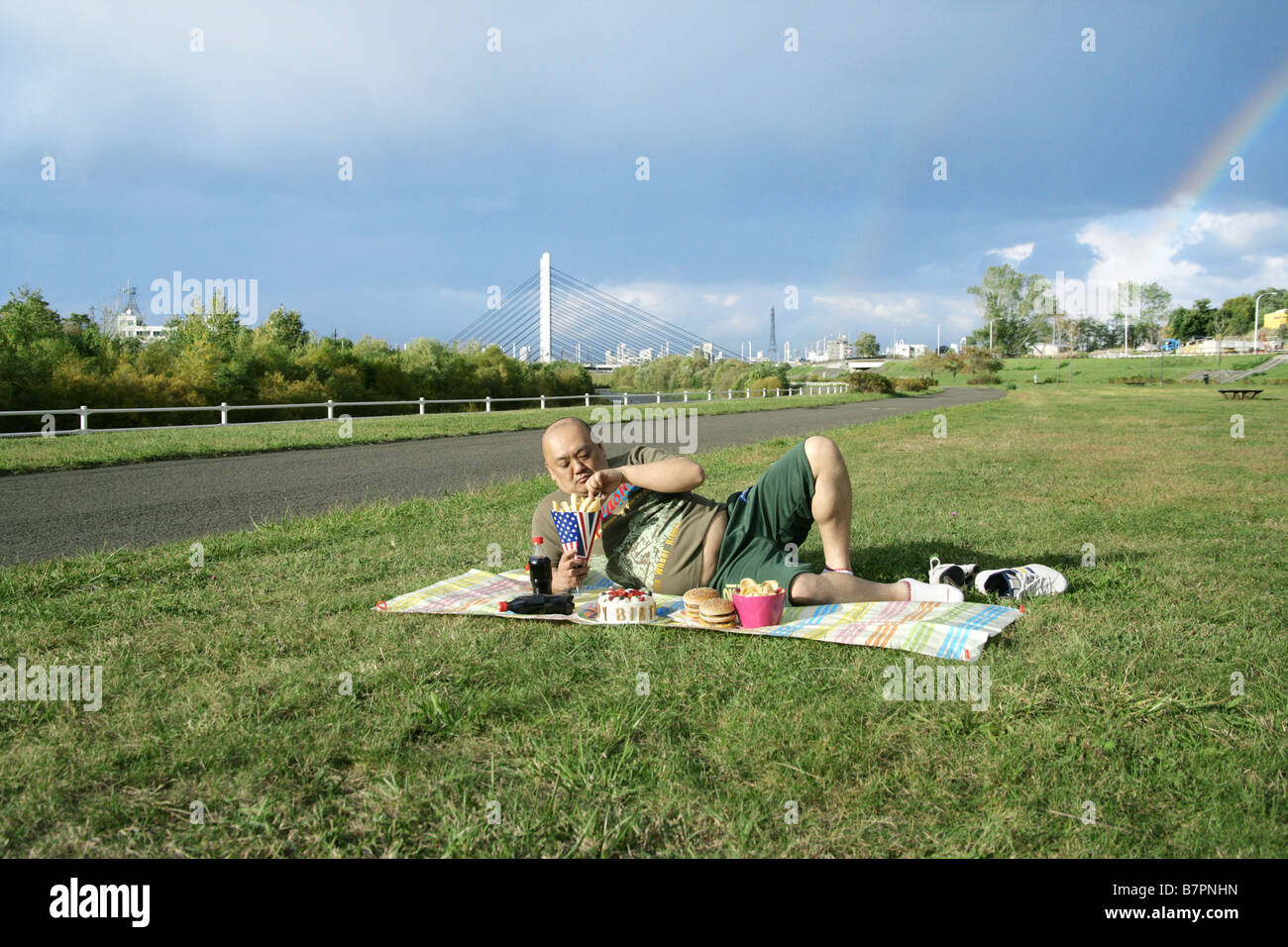 A Man Eating Fast Food Stock Photo Alamy a-man-eating-fast-food-stock-photo-alamy