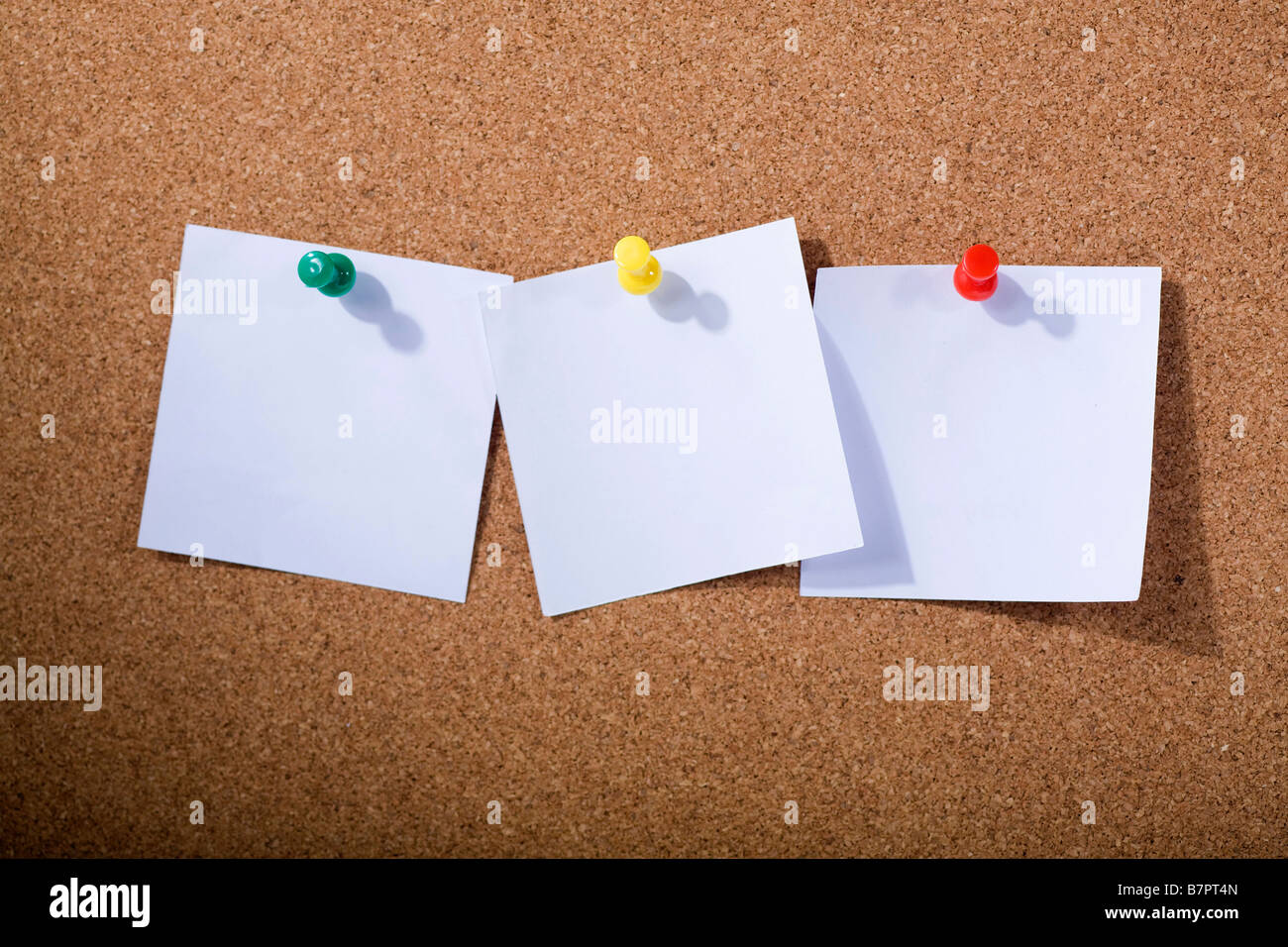Notes on a bulletin board Stock Photo Alamy