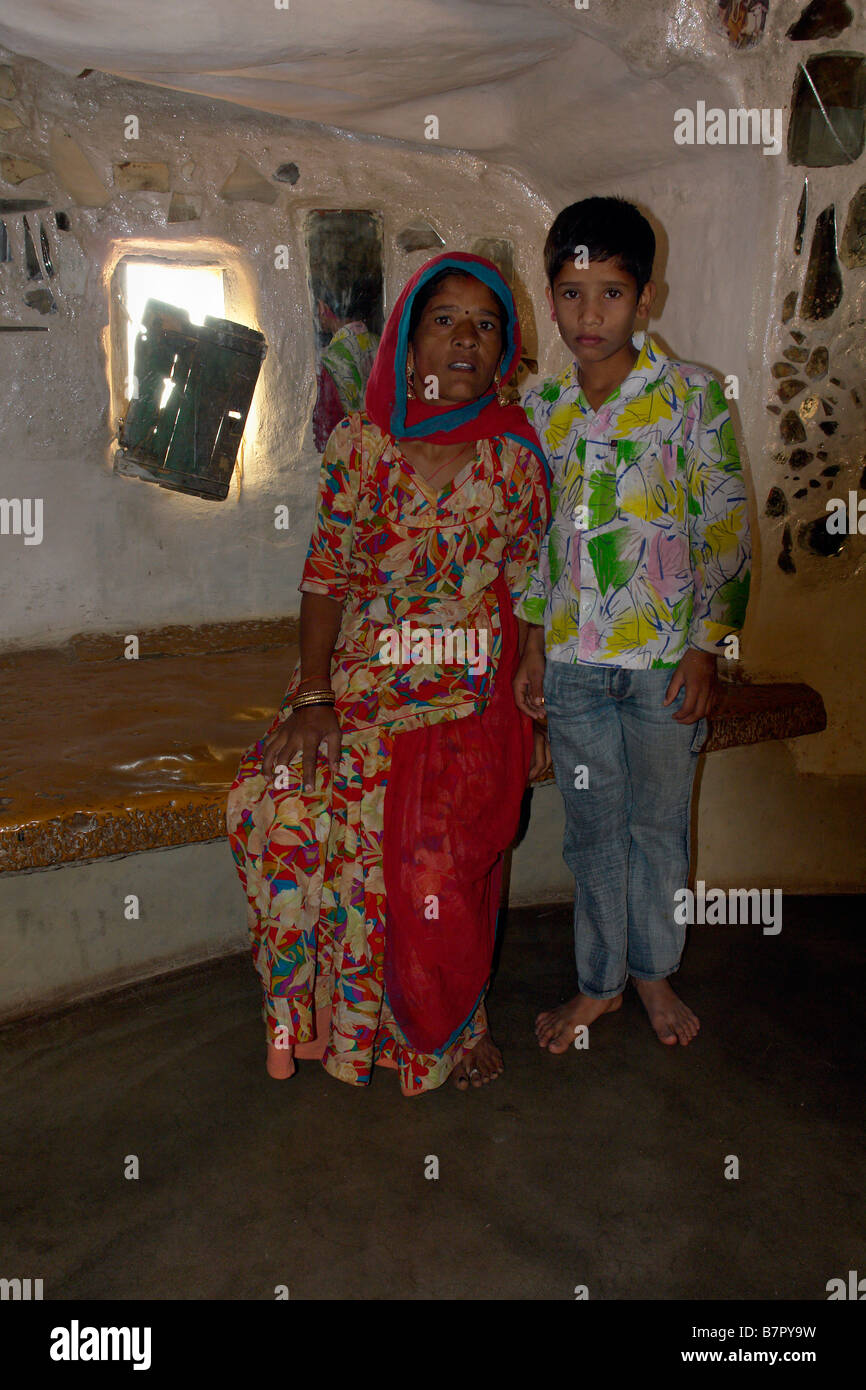 mother and boy inside traditional indian house in the old fort area of jaisalmer Stock Photo