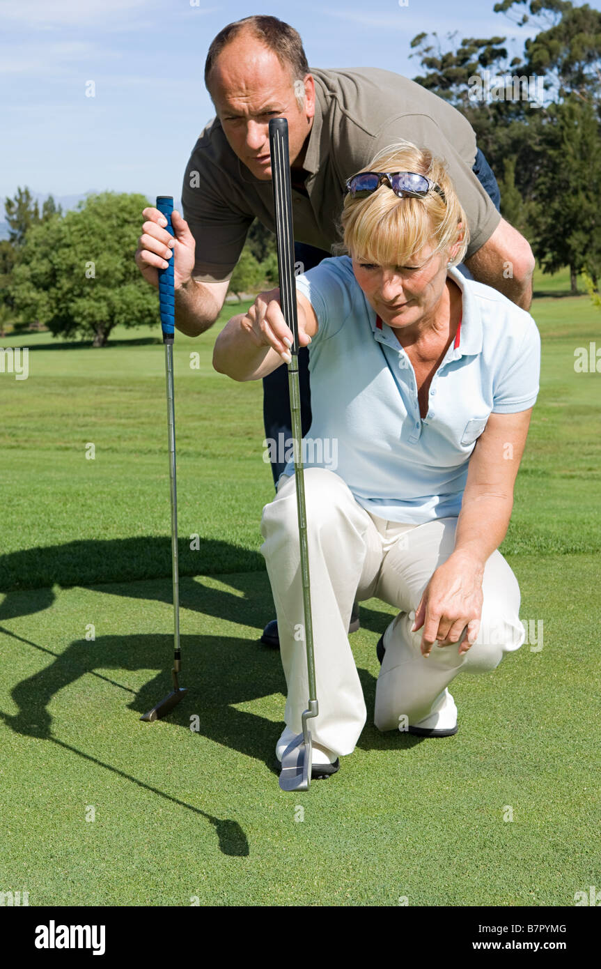 Golfers playing golf Stock Photo Alamy