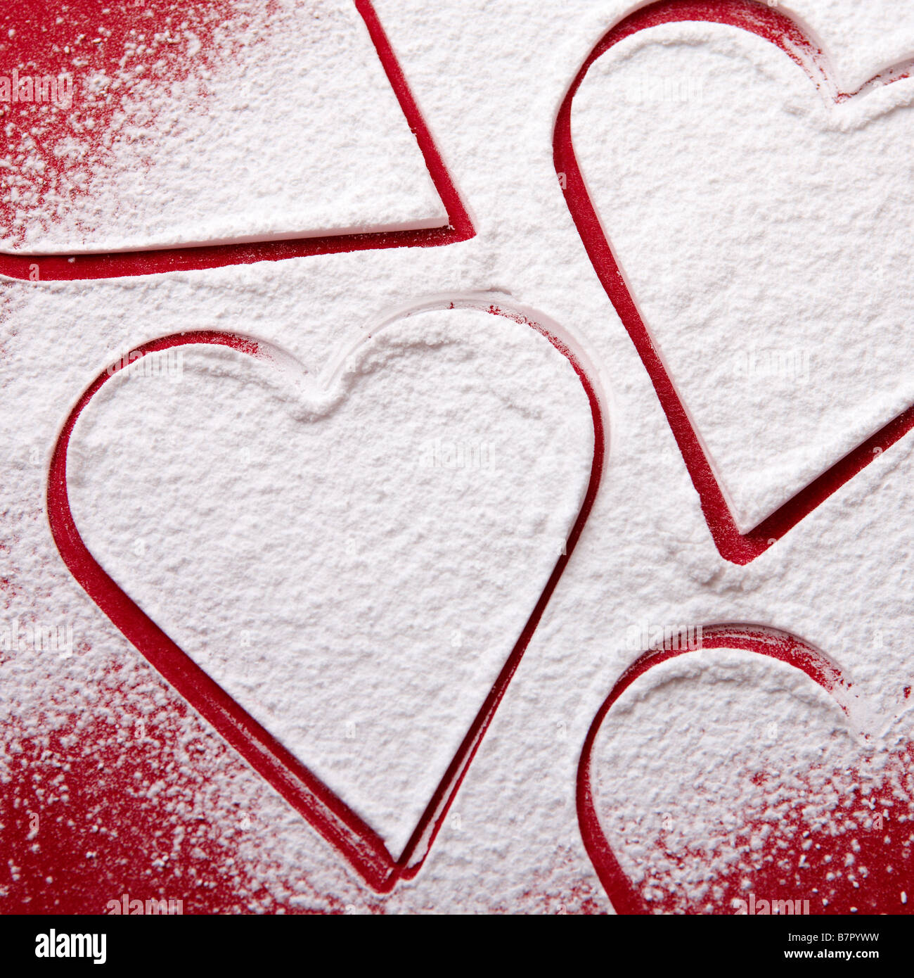 Love hearts in icing sugar Stock Photo Alamy