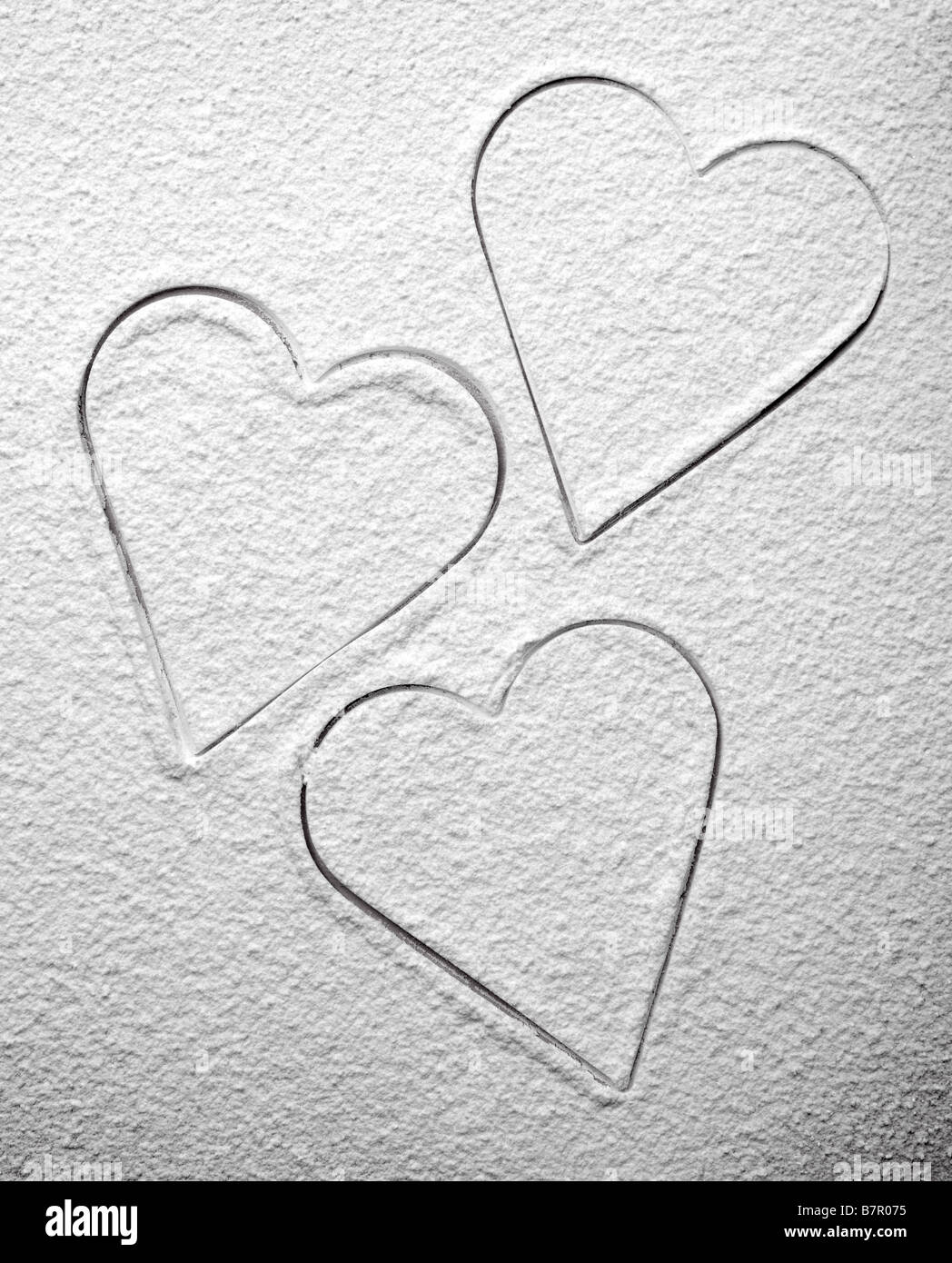 Love hearts in icing sugar Stock Photo Alamy