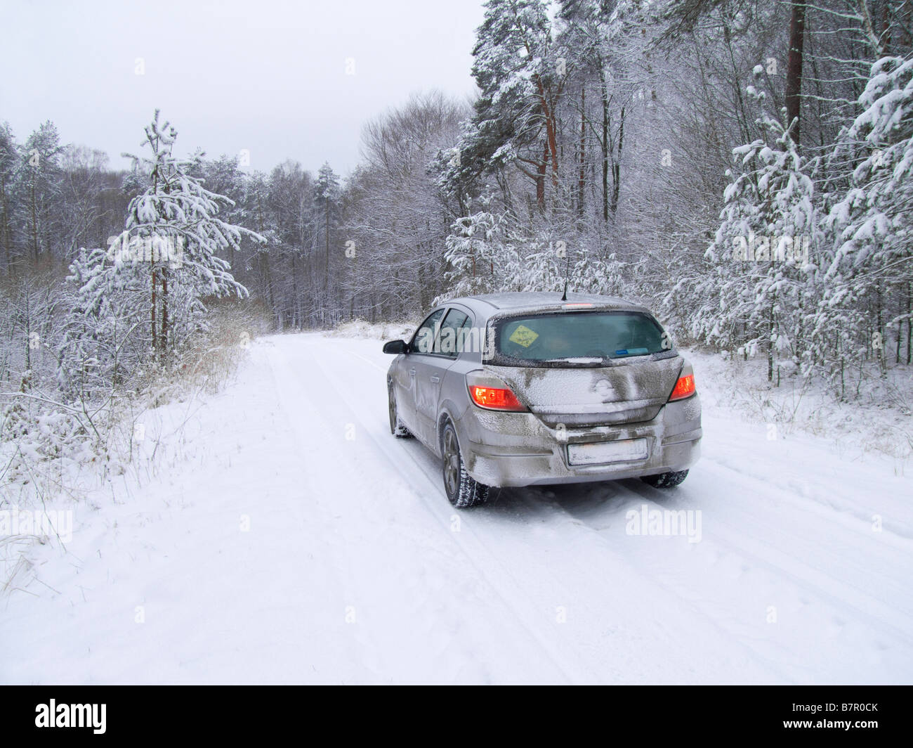 Car in the winter forest - extreme weather Stock Photo