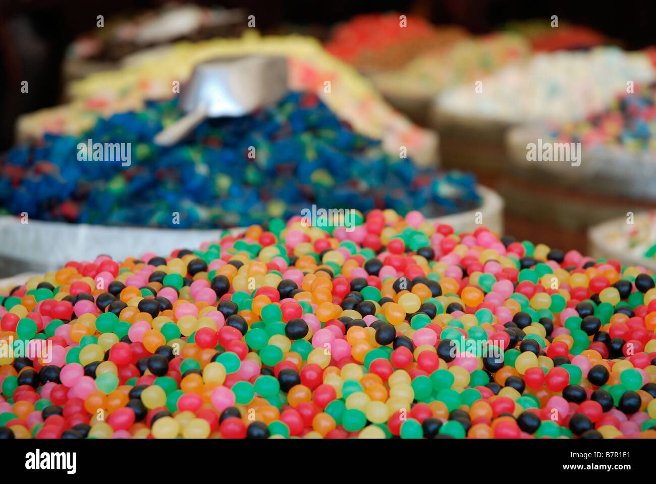 A barrel full of jelly beans in a sweet shop in St. Tropez, France