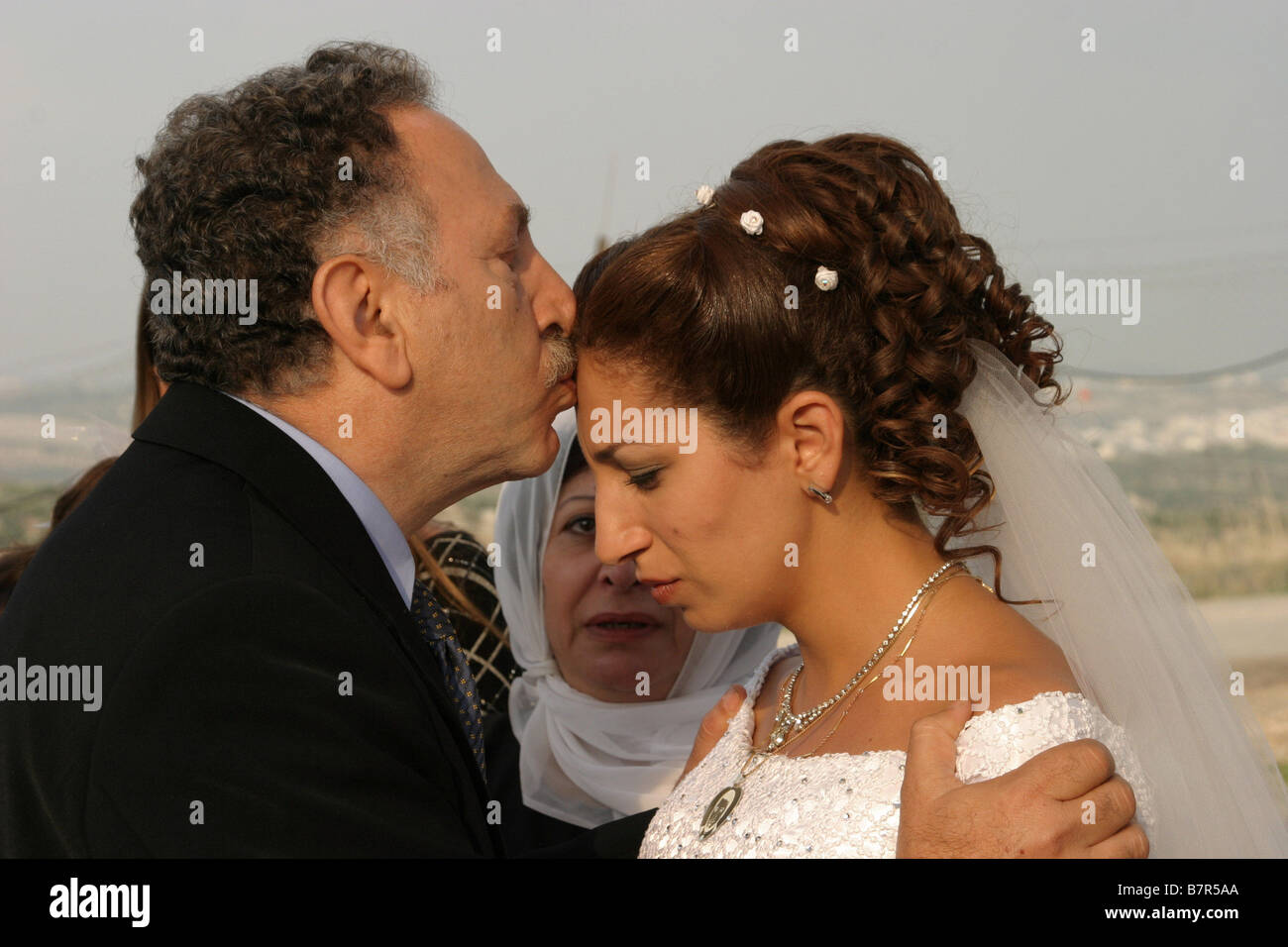 The Syrian Bride Ha-Kala Ha-Surit Year: 2004  Makram J. Khoury, Clara Khoury  Director: Eran Riklis Stock Photo