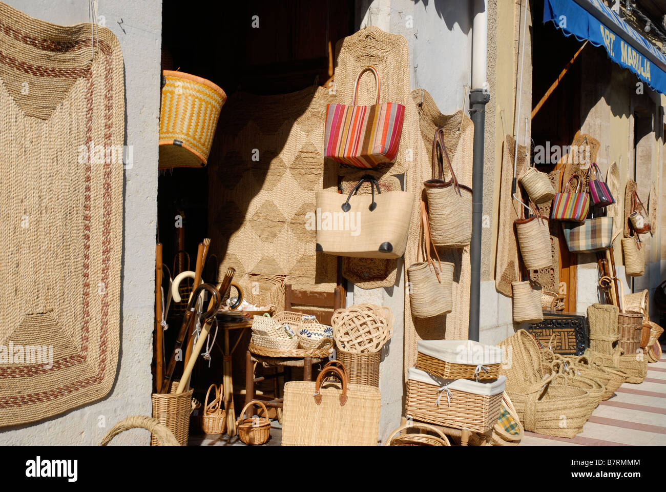 baskets and straw mats displayed outside souvenir shop, Gata de