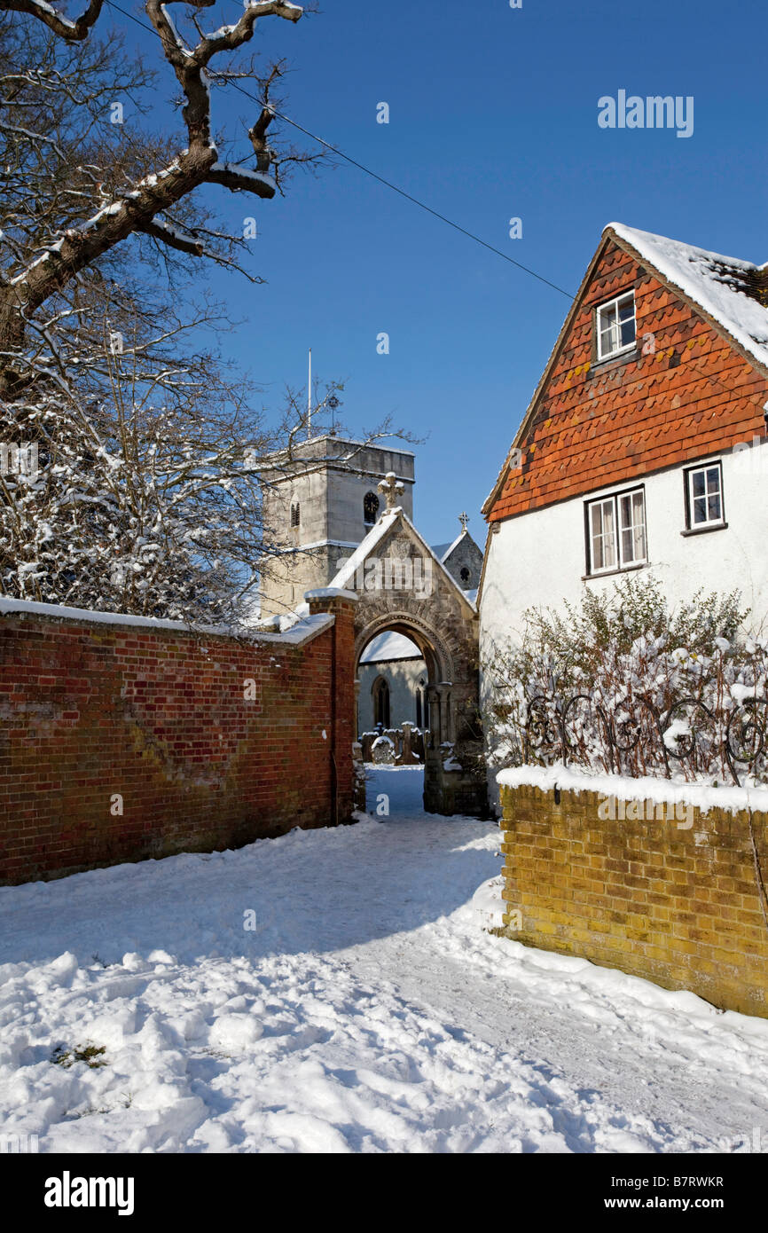Betchworth Surrey St Michael's churchyard entrance in the snow Stock