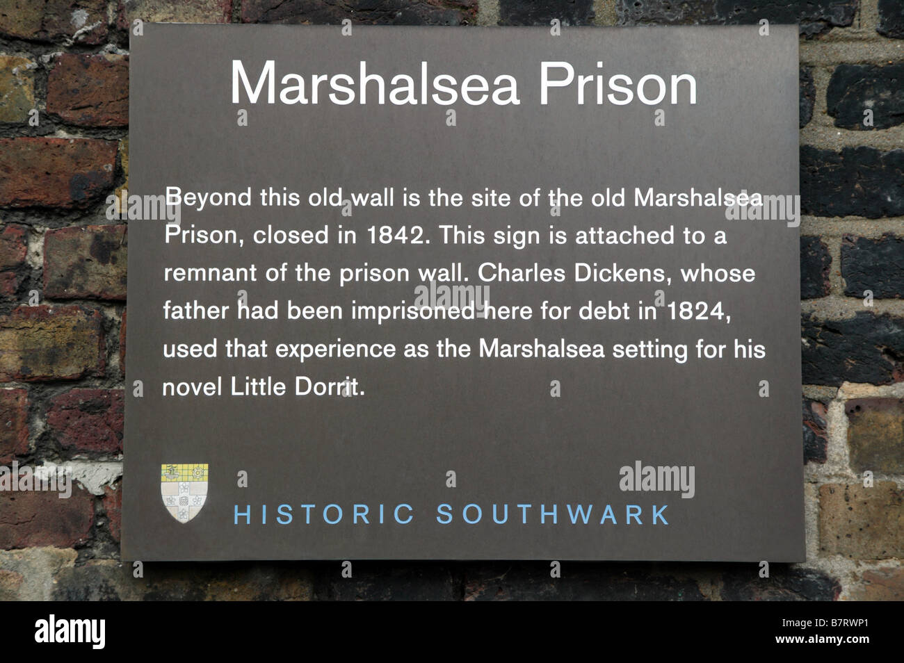 A Sign marking the only surviving remnants of the Marshalsea prison in Southwalk Stock Photo
