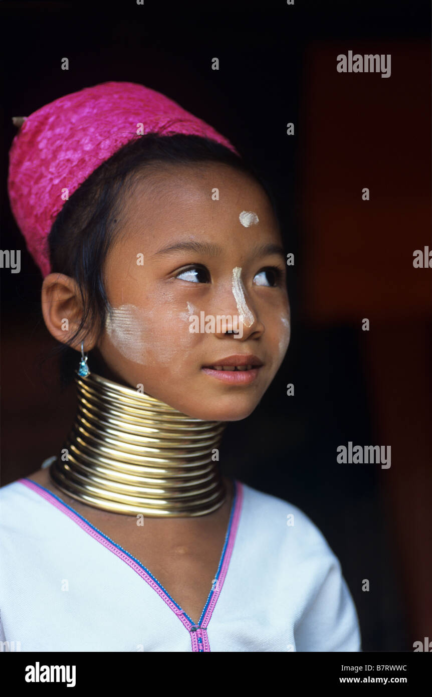 A young Burmese Padaung ( Kayan or Karenni ) long-necked Girl, living in a Refugee Camp nr Thaton, Chiang Mai Province, Thailand Stock Photo