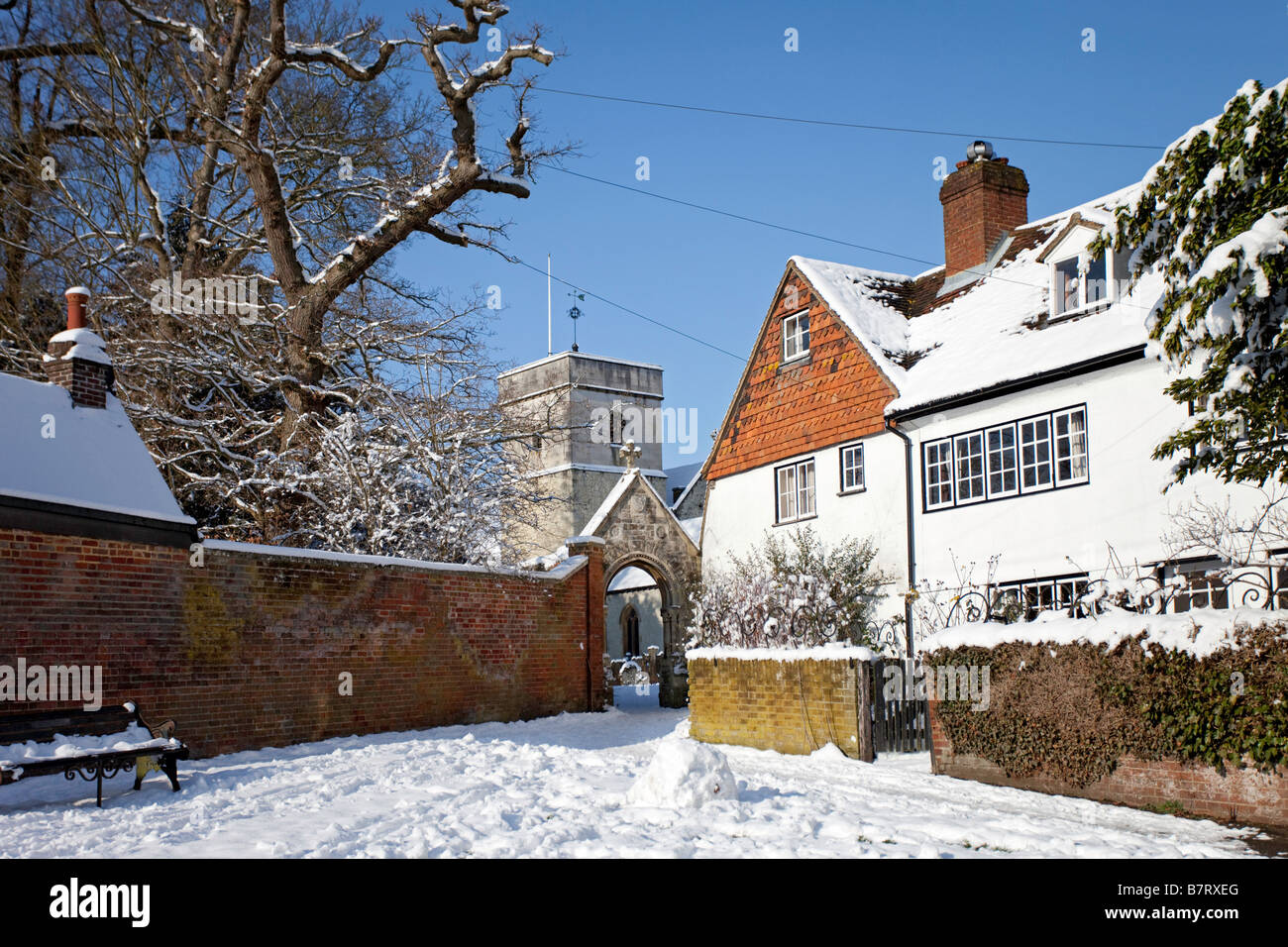 Betchworth Surrey St Michael's churchyard entrance in the snow Stock