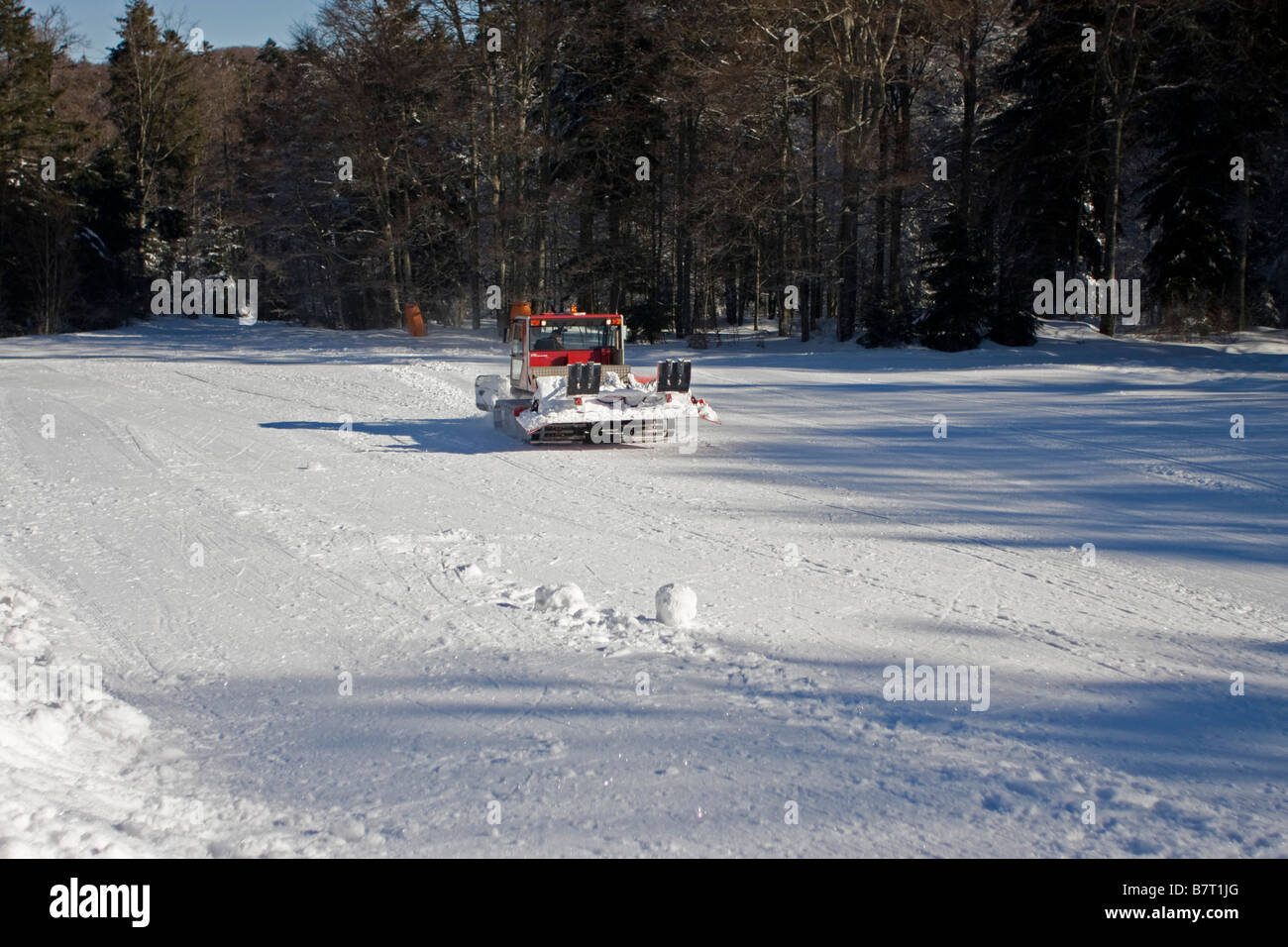 Snow plough caterpillar working on ski slope,dameuses,Winter col de l