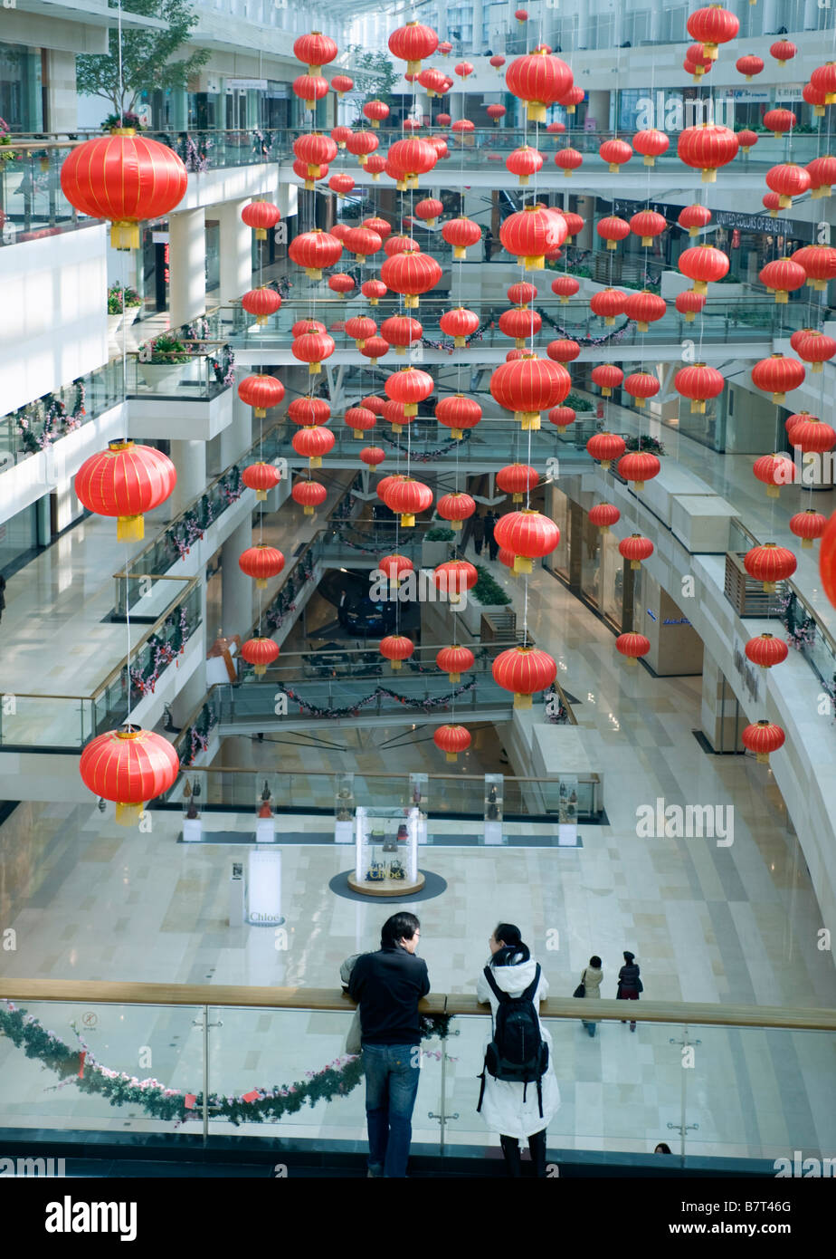 Interior of modern upmarket Seasons Place shopping mall in central Beijing China Stock Photo