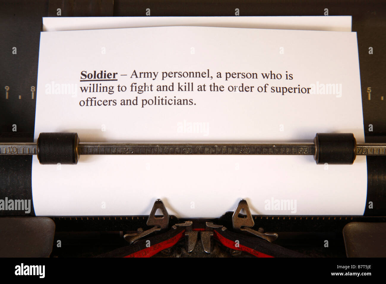 Definition of a soldier in a typewriter Stock Photo Alamy