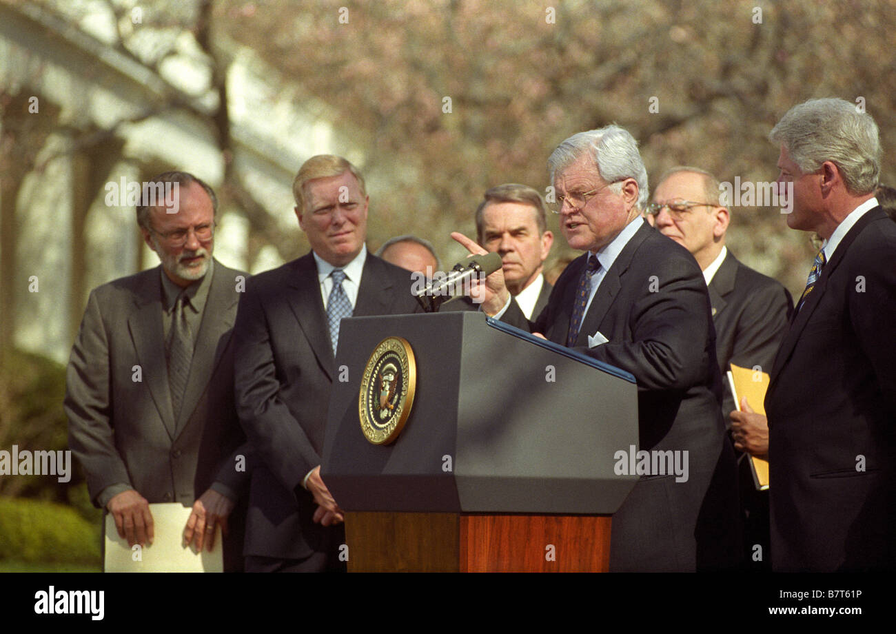 US Senator Ted Kennedy (3rd R), D-MA, speaks in support of raising the minimum wage at the White House in Washington DC. Stock Photo