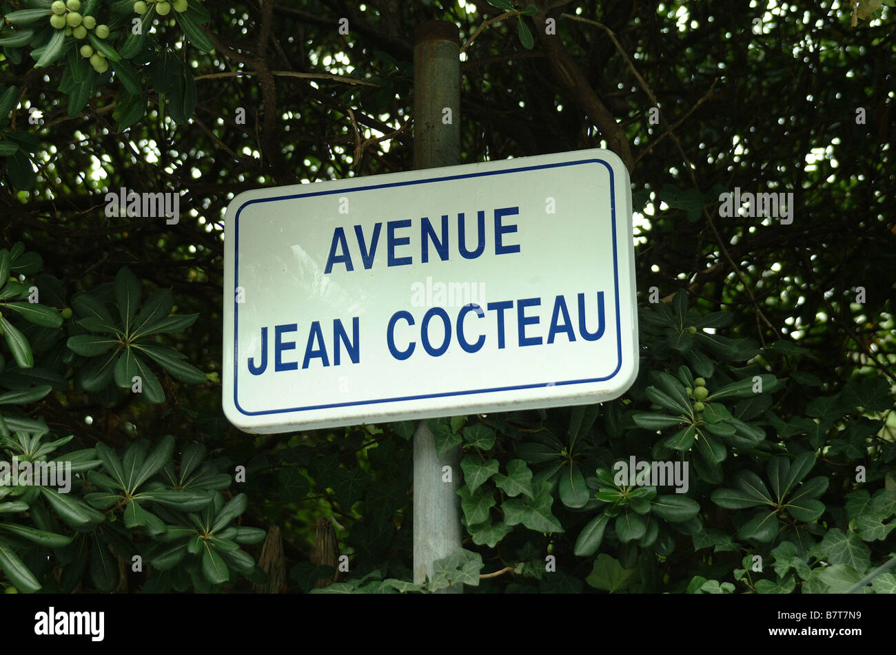 Street sign for Avenue Jean Cocteau on Cap Ferrat, Cote d'Azure where Villa Santo-Sospir stands once the home of Jean Cocteau. Stock Photo