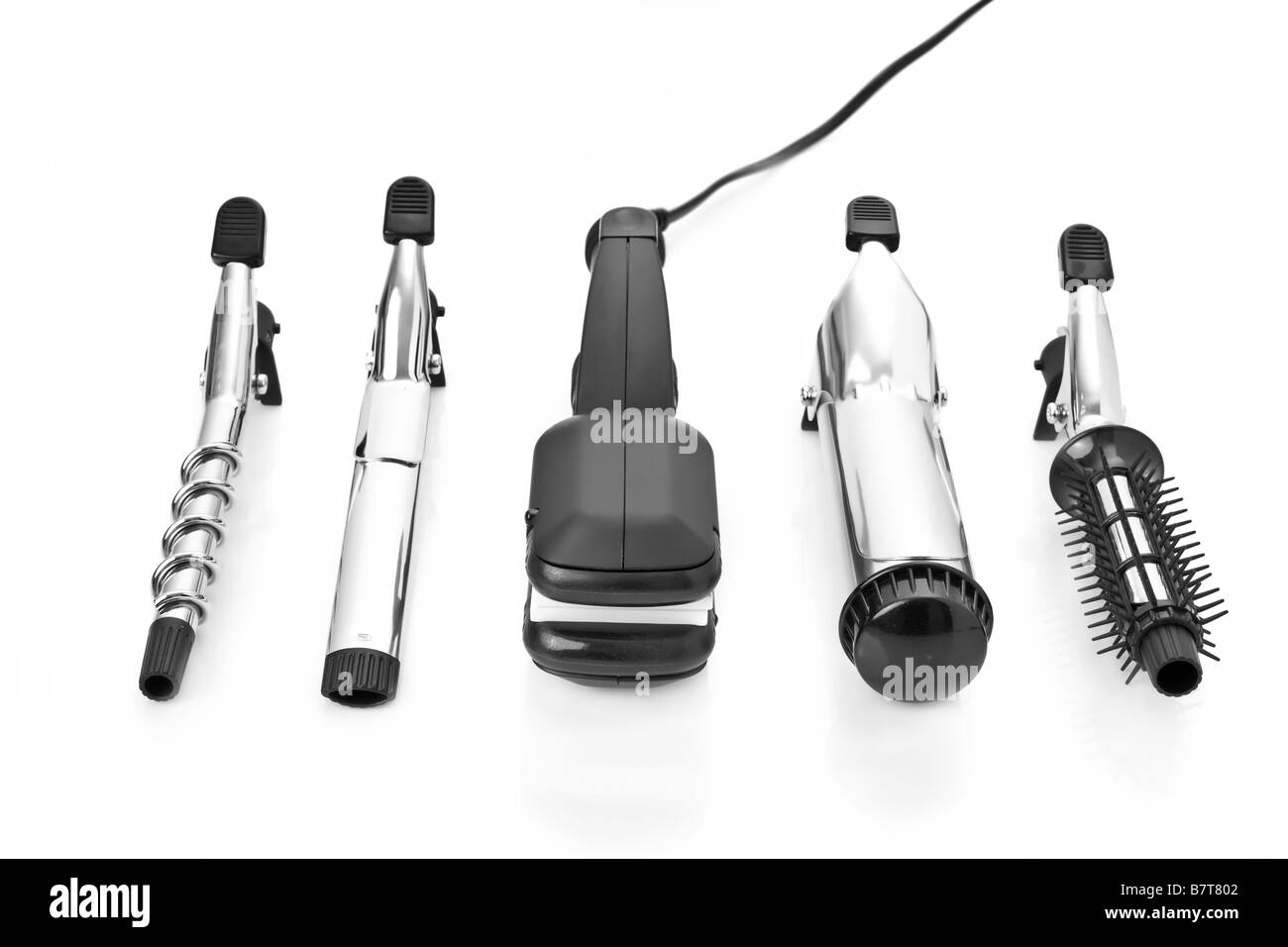 Hair styling set with straightener and curling accessories Stock Photo