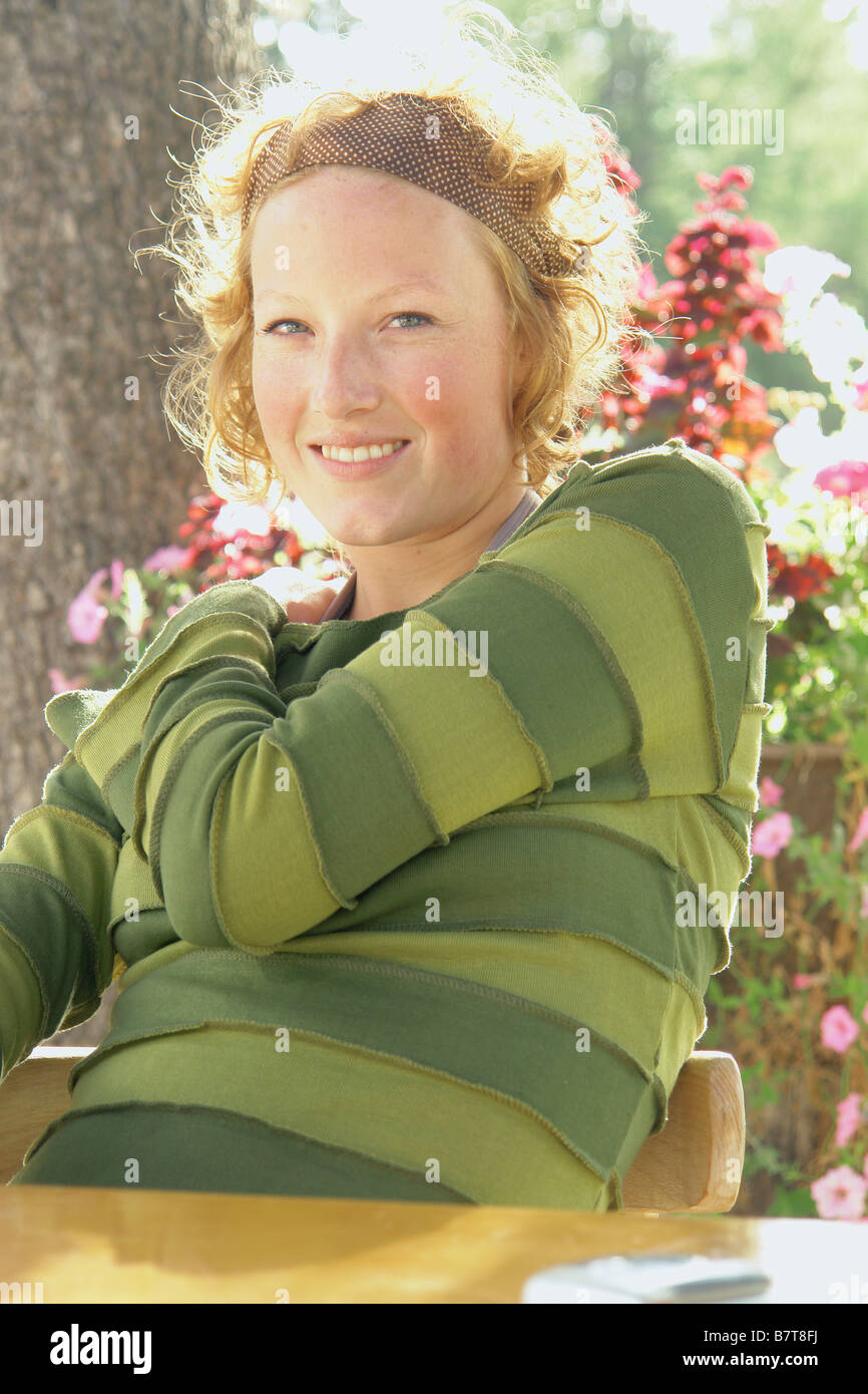 Smiling woman in striped top, Clear Lake, Riding Mountain National Park, Manitoba, Canada Stock Photo