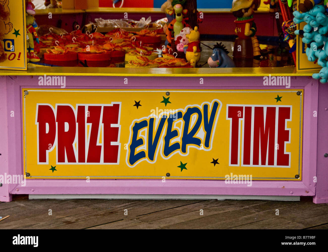 Prize every time sign at seaside amusements. UK. Stock Photo