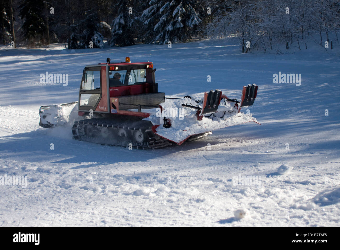 Snow plough caterpillar working on ski slope,dameuses,Winter col de l