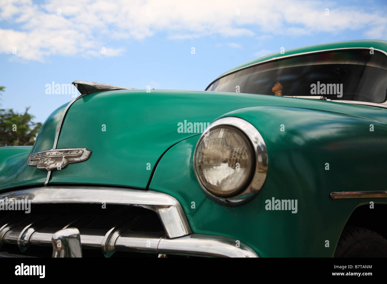 An old green American car in Cuba Stock Photo
