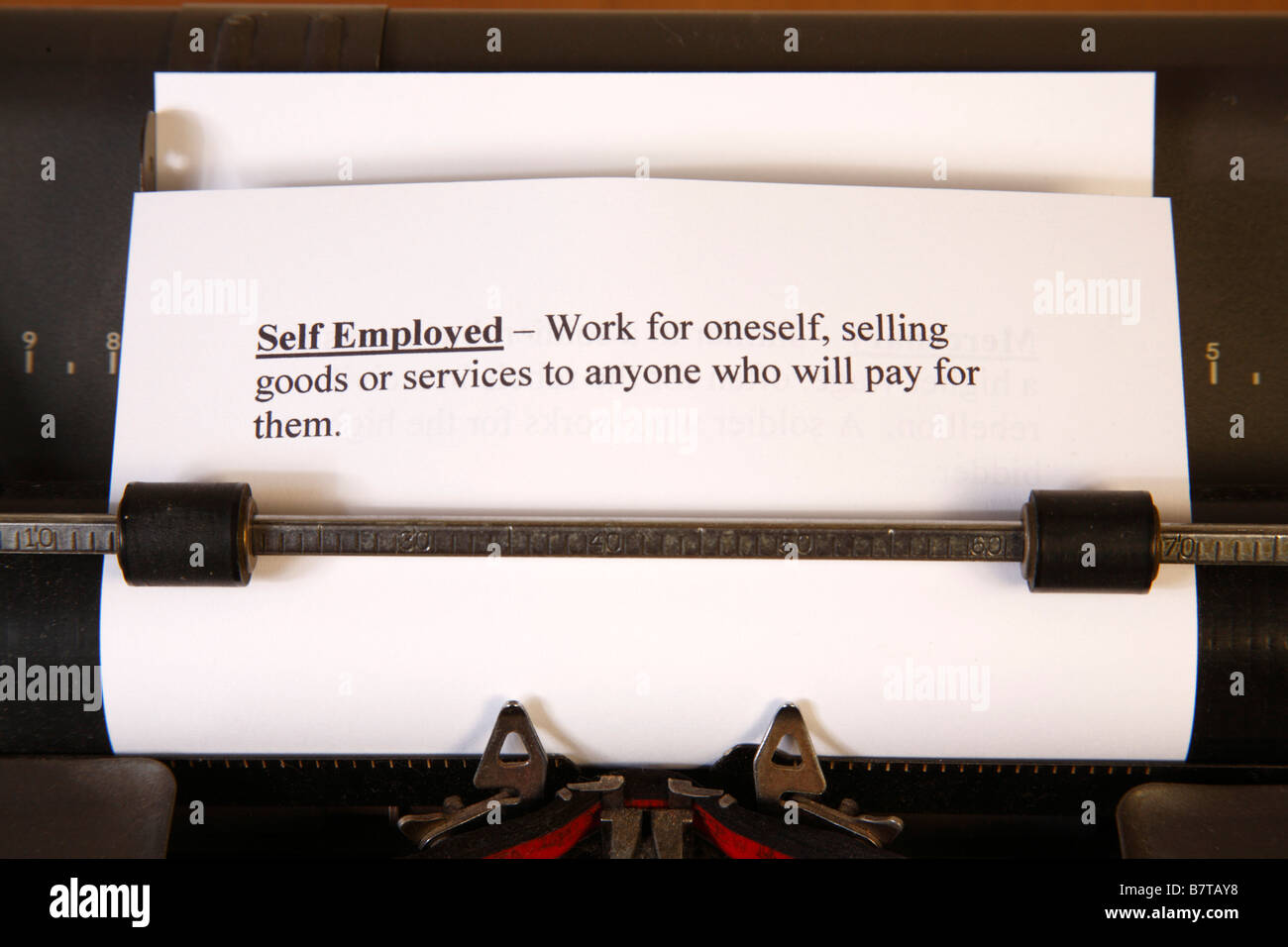 Definition or selfemployed in typewriter Stock Photo Alamy