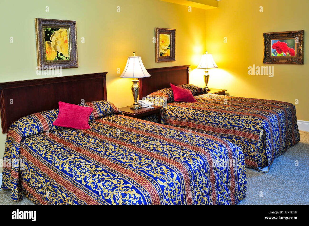 Bedroom interior with two double beds images on the wall are my own ...