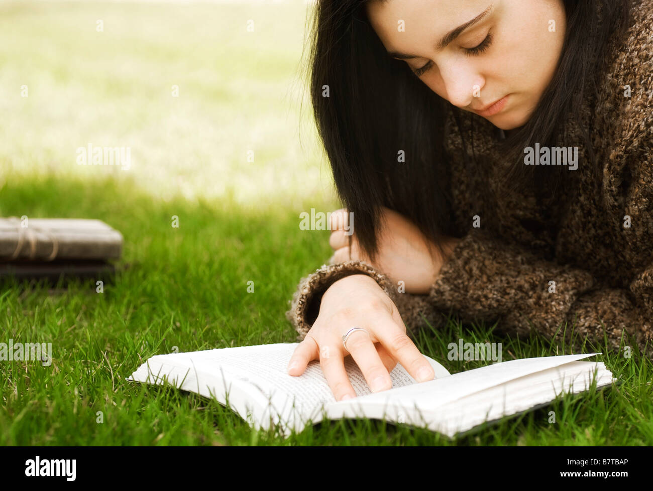 Woman reading a book Stock Photo