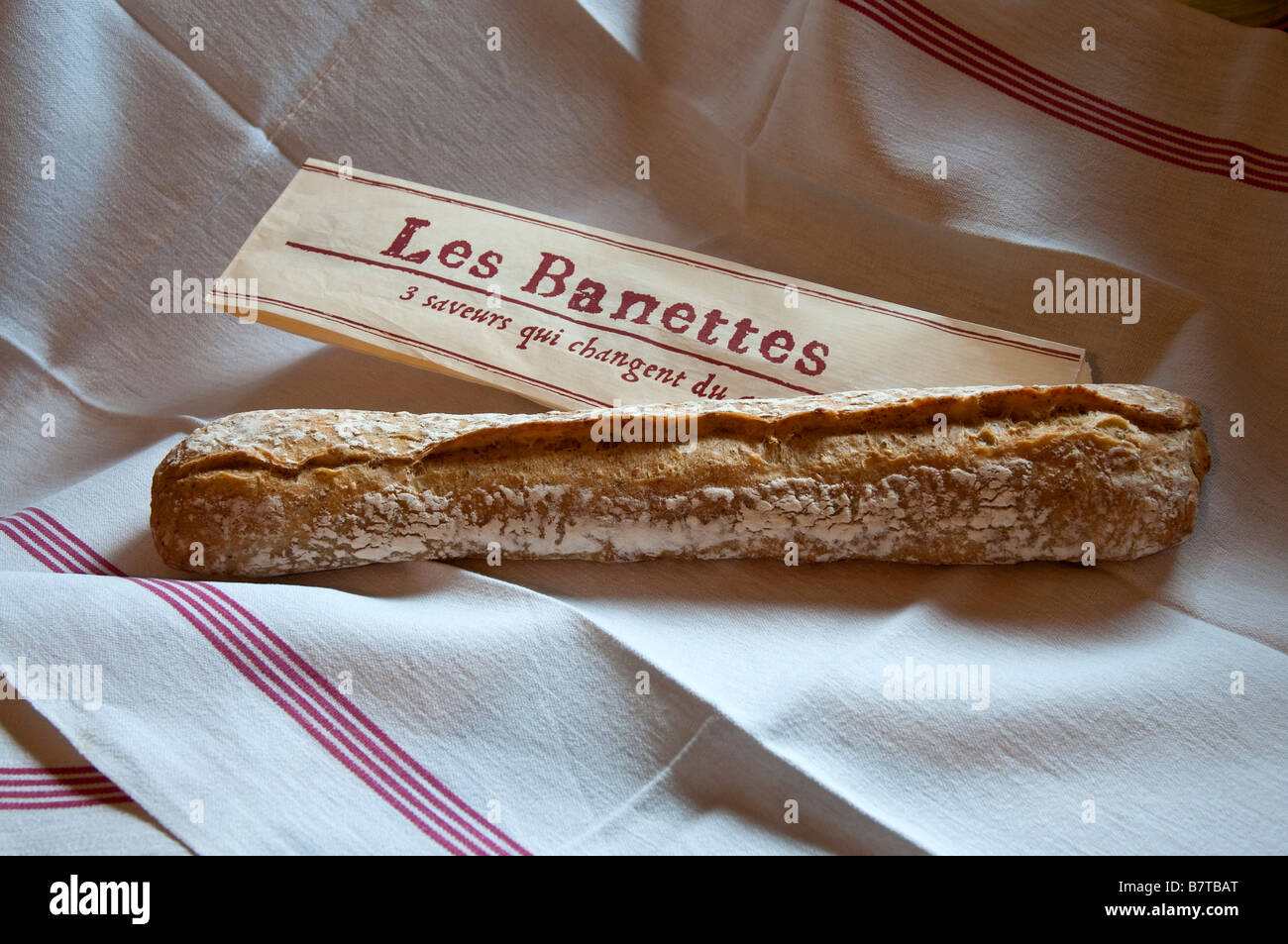 French Banette / baguette with paper bag - France Stock Photo - Alamy