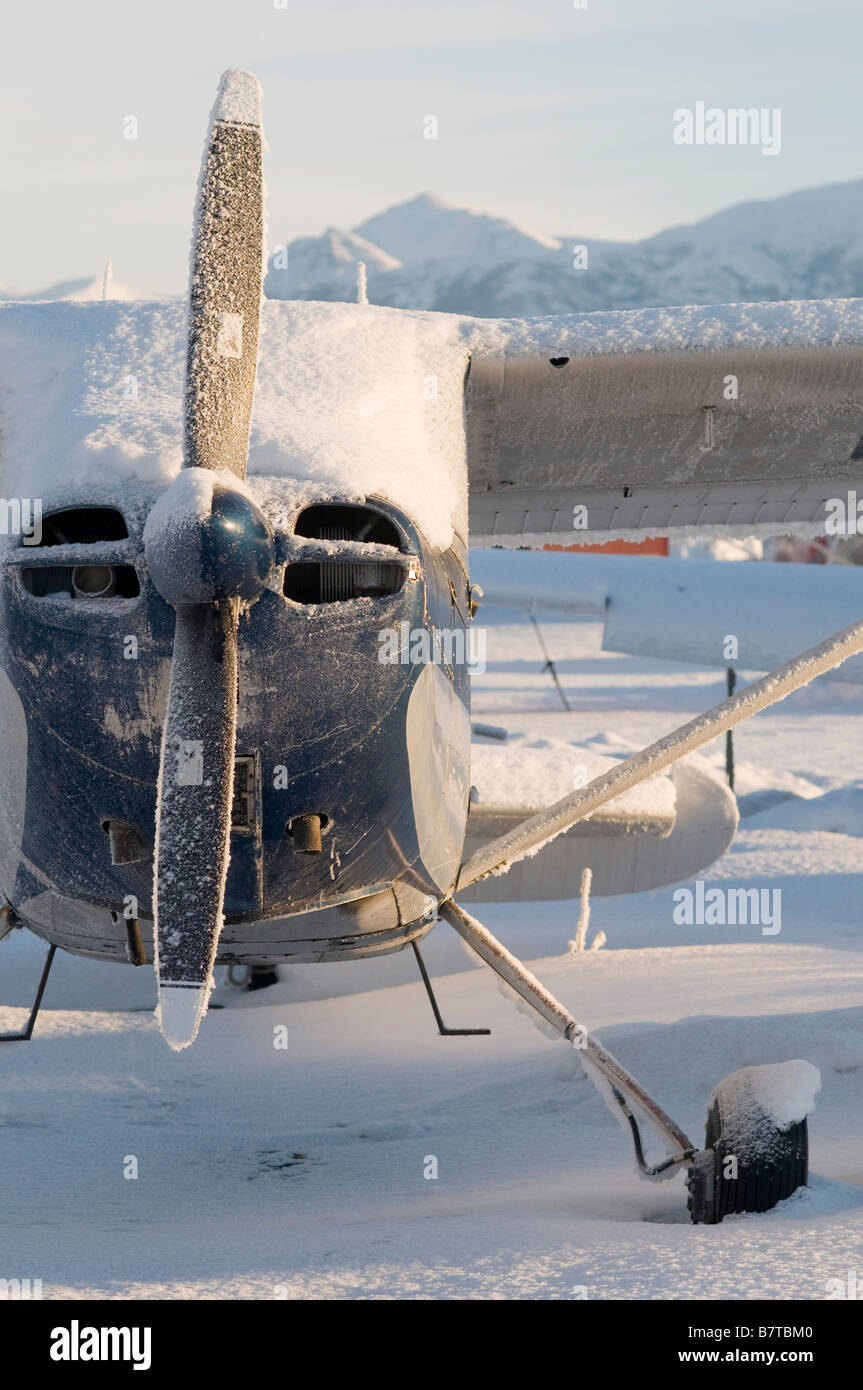 Snow covered tailwheel Cessna 170 airplane, Merrill Field, Anchorage, Alaska Stock Photo