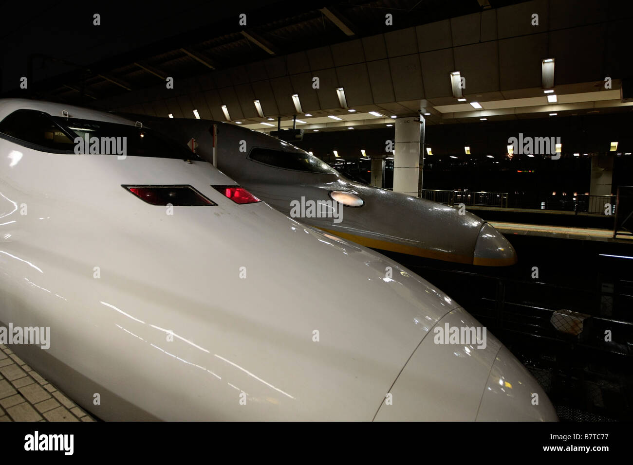 Japanese Shinkansen bullet trains waits to depart from Tokyo railway station. Stock Photo