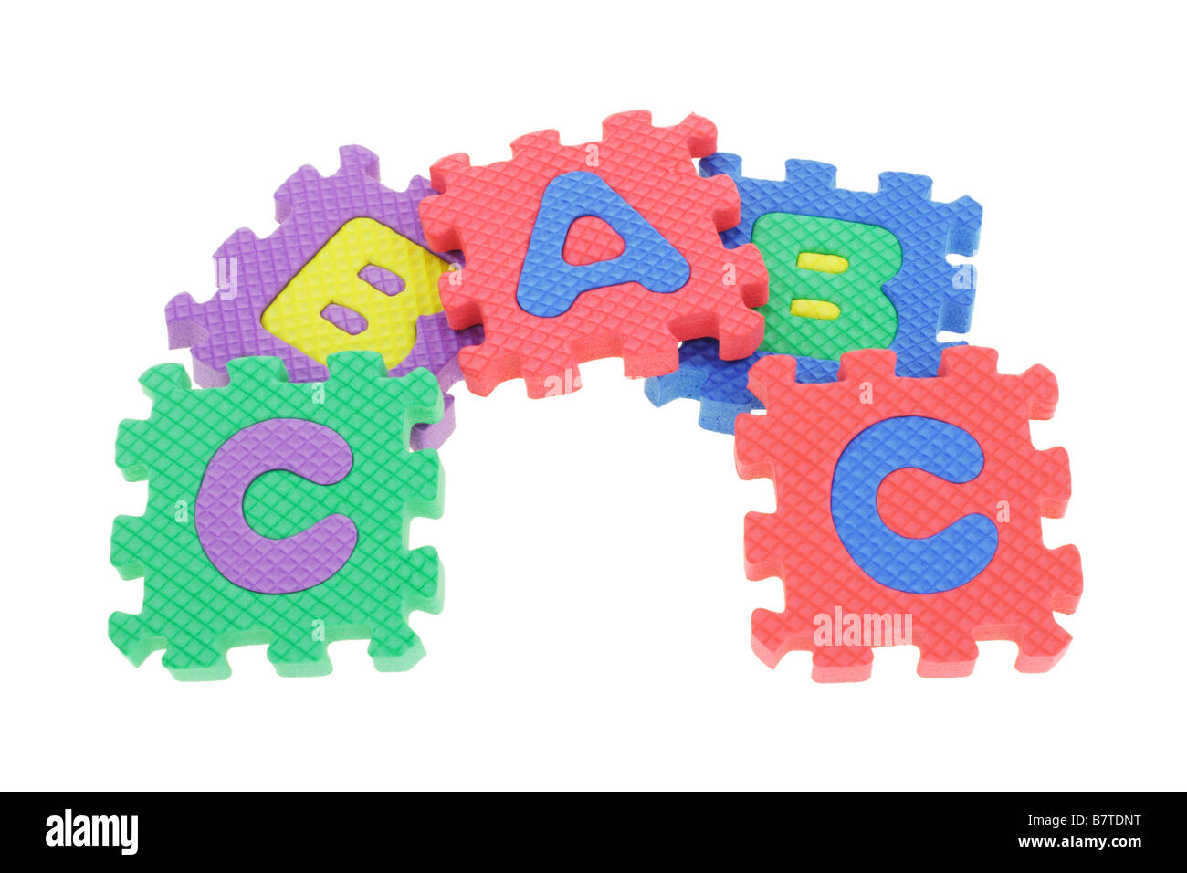 Colorful puzzle blocks arranged on white background Stock Photo