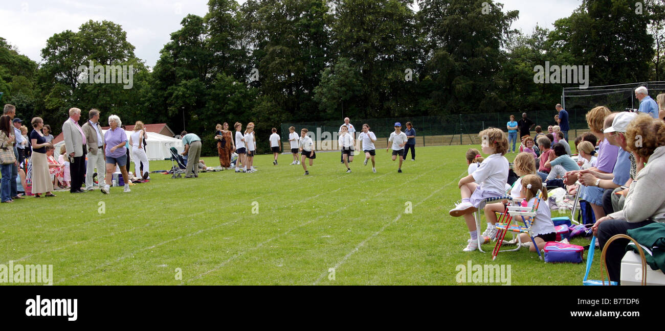 Young children in school UK; Children in a running race, Primary school sports day, England UK Stock Photo