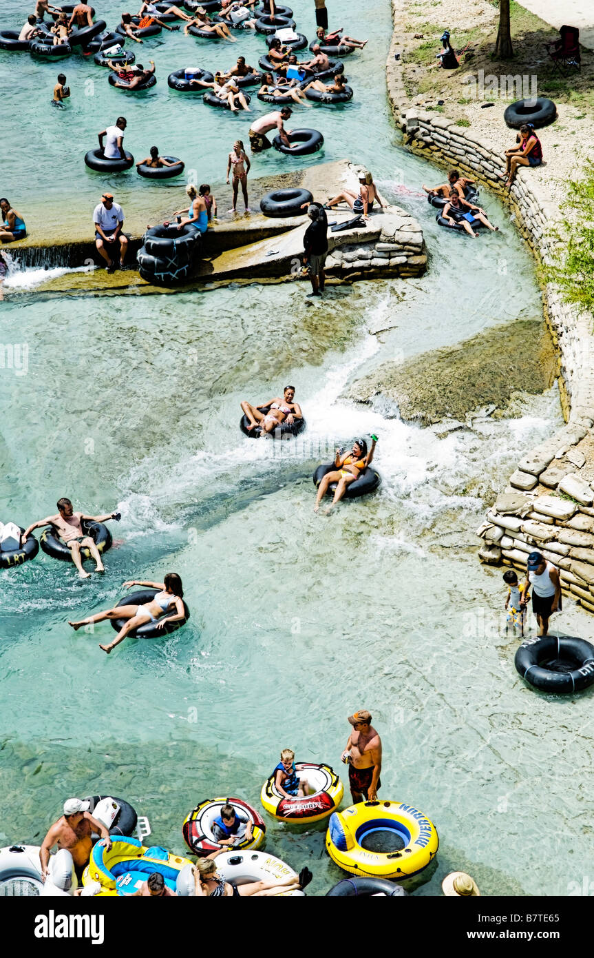 Stylized photo of people tubing the chute on the Guadalupe River in