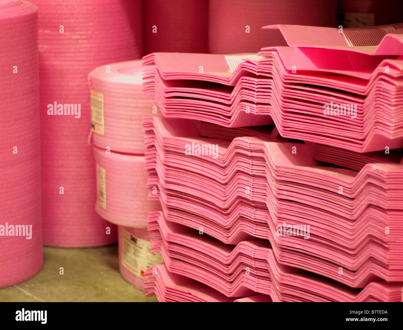 Various sizes and shapes of pink foam insulation on display for sale at