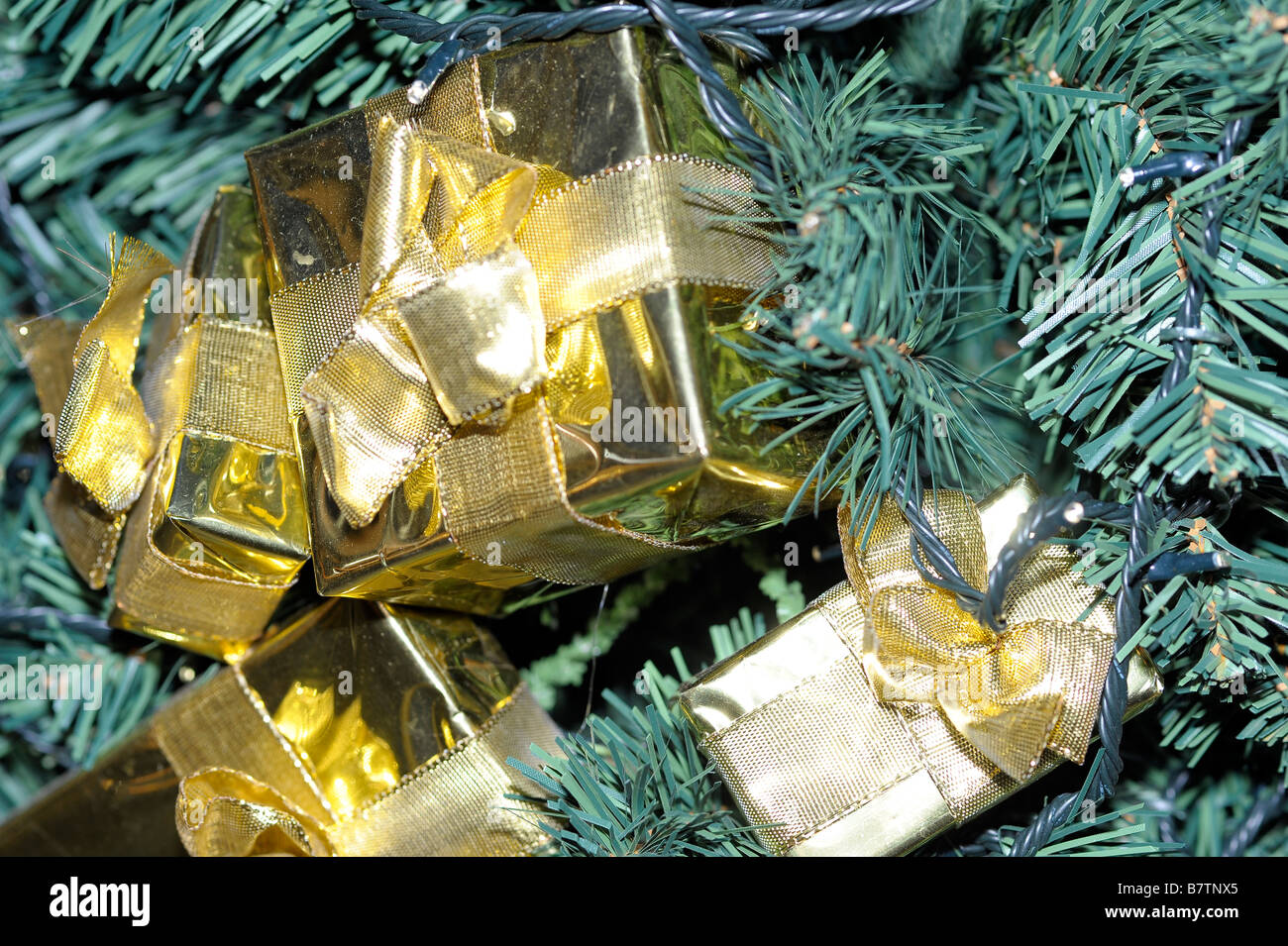 gold golden present boxes gifts celebration christmas tree Stock Photo