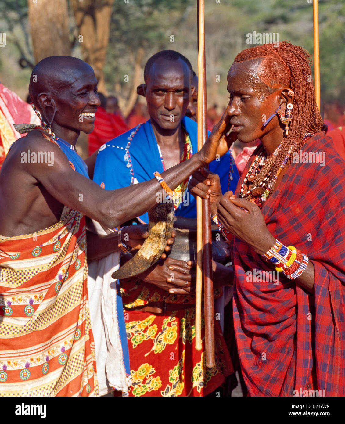 Africa, Kenya, Kajiado District, Ol doinyo Orok. A Maasai elder blesses a warrior during an Eunoto ceremony Stock Photo