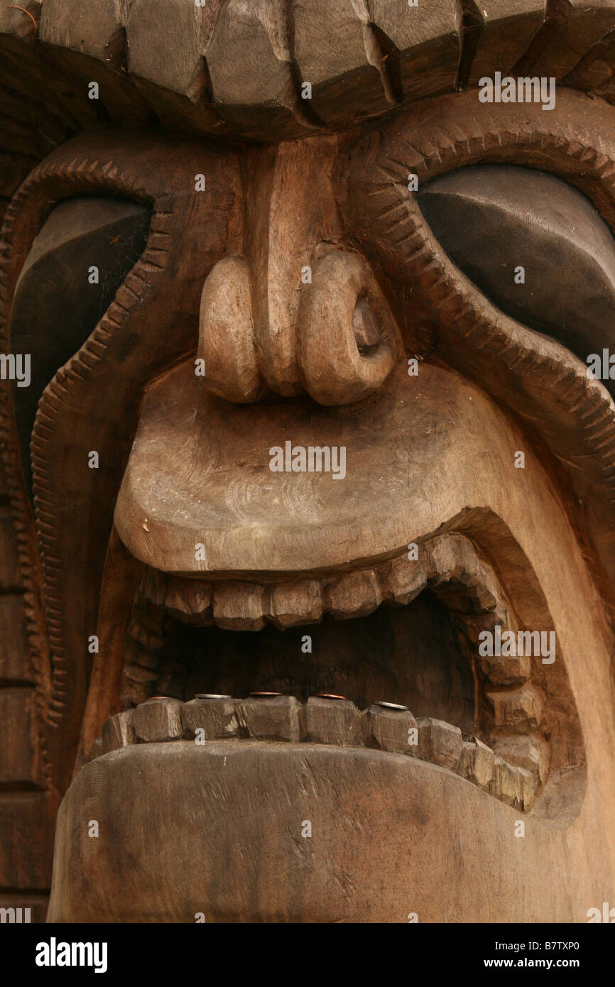 a large wooden carving of a tiki idol in maui, hawaii Stock Photo