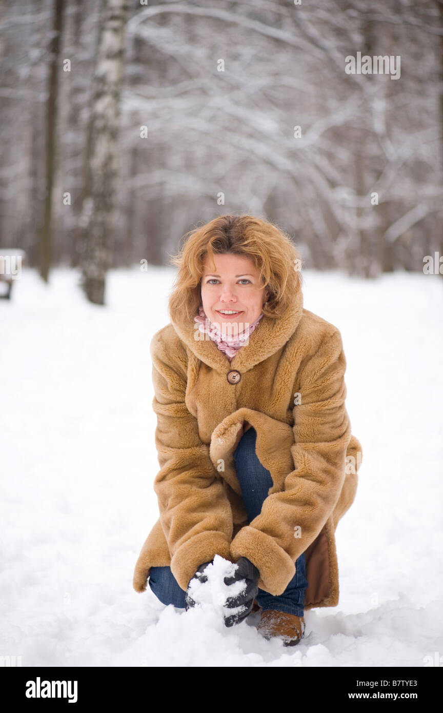portrait on white woman in the fur coat Stock Photo - Alamy