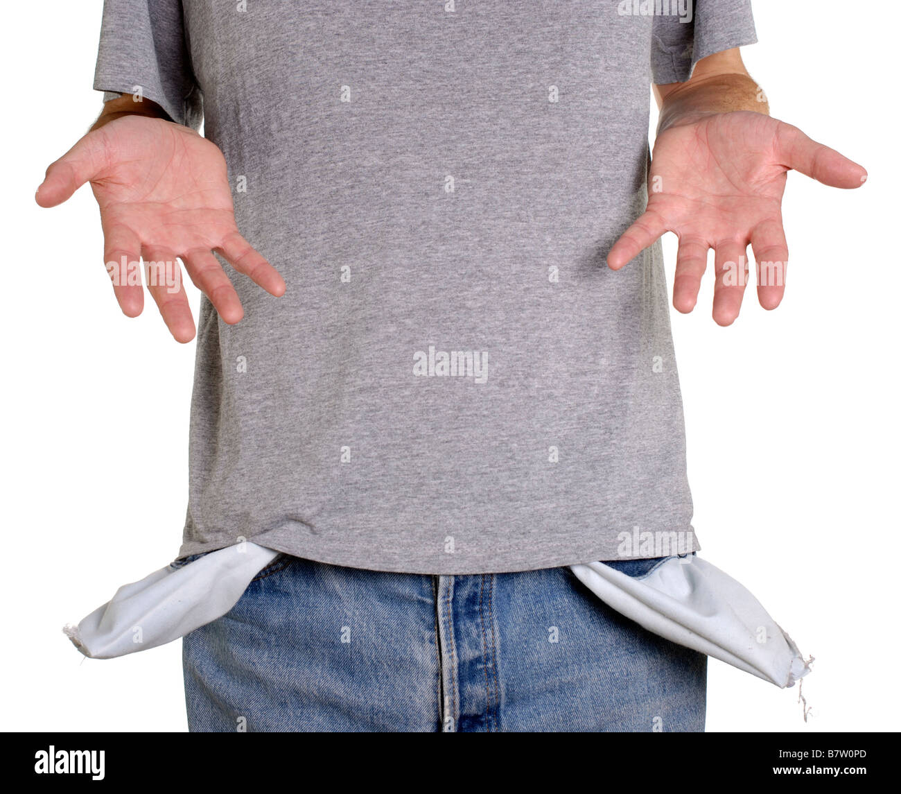 Conceptual shot of man with empty pockets showing he has no money Stock Photo