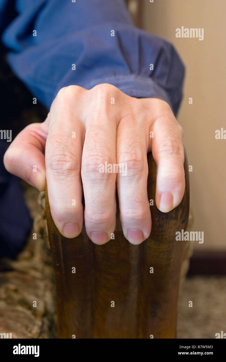 hand grasping armchair Stock Photo Alamy