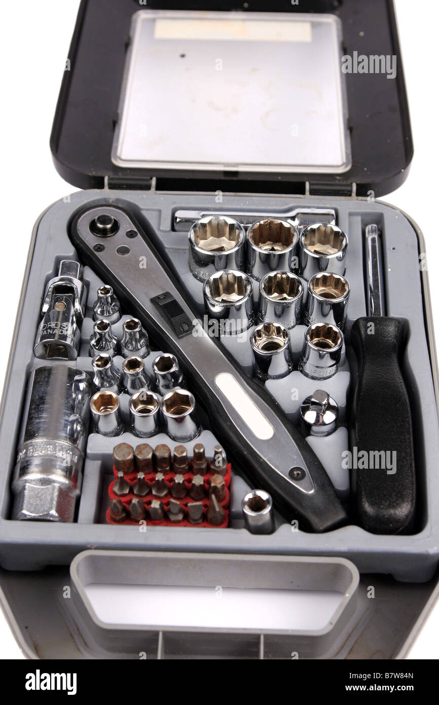 A complete socket toool set in a plastic case against a white ...