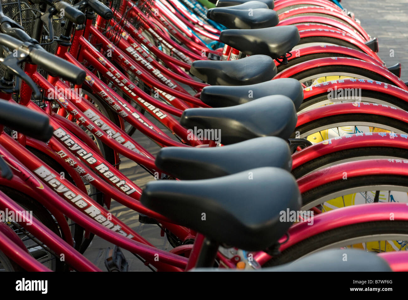 Row of rental bicycles on street in central Beijing 2009 Stock Photo